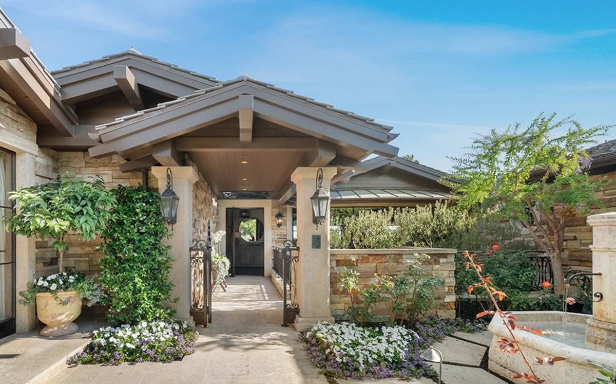 The stone entry court and fountain of 15 Montage Way, the late General Dynamics chairman James Mellor's Montage estate, listed at $29 million.
