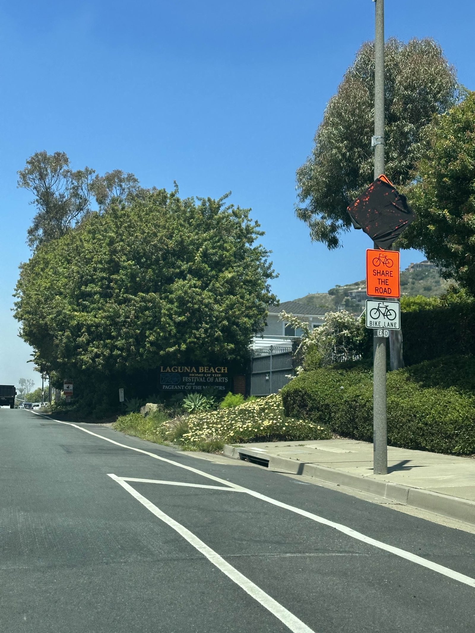 Laguna Canyon Road at the Festival of Arts sign, marking the city's festival district during the October run.