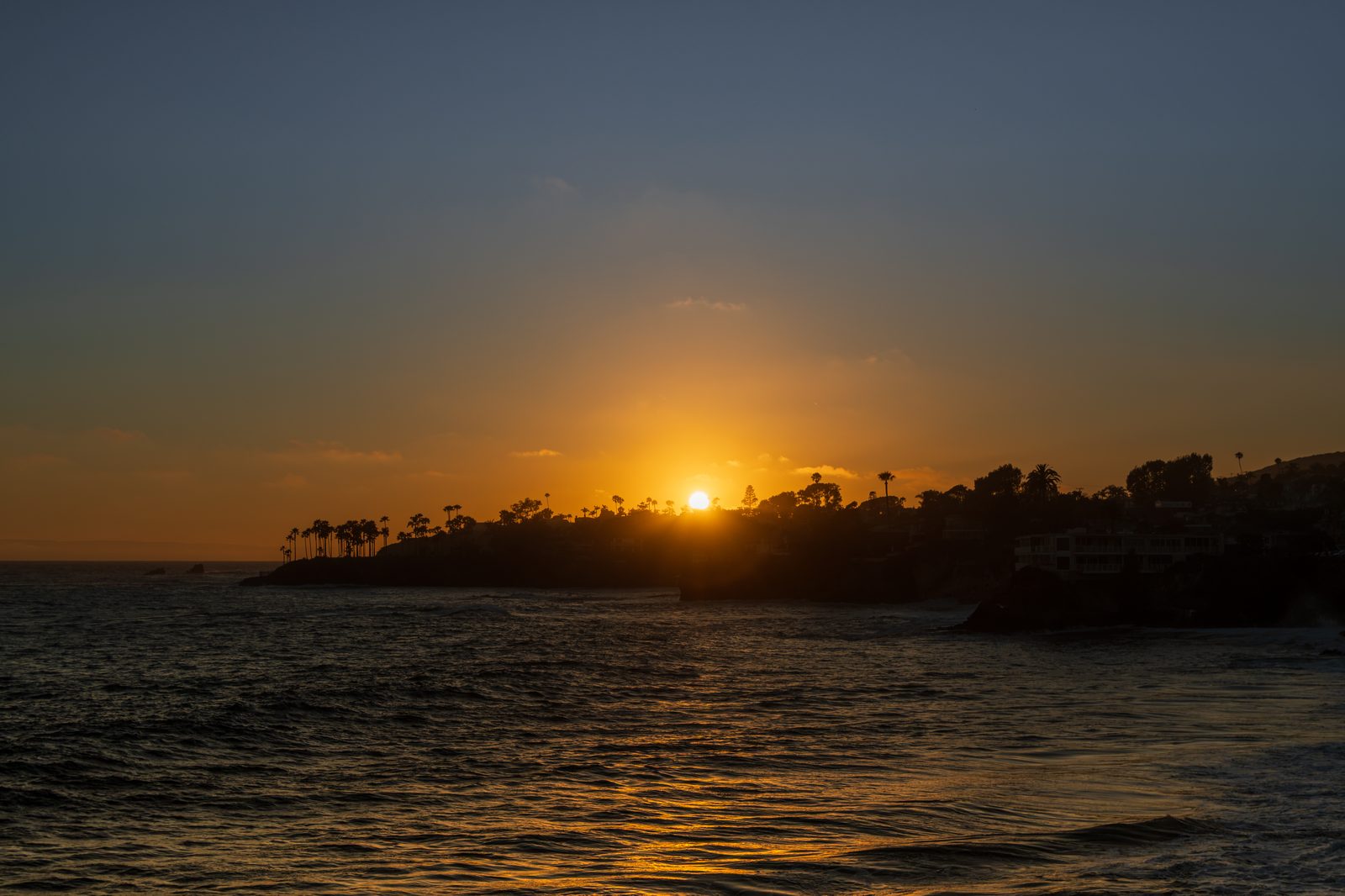 The sun sets over the Laguna Beach headlands during the festival's October run.