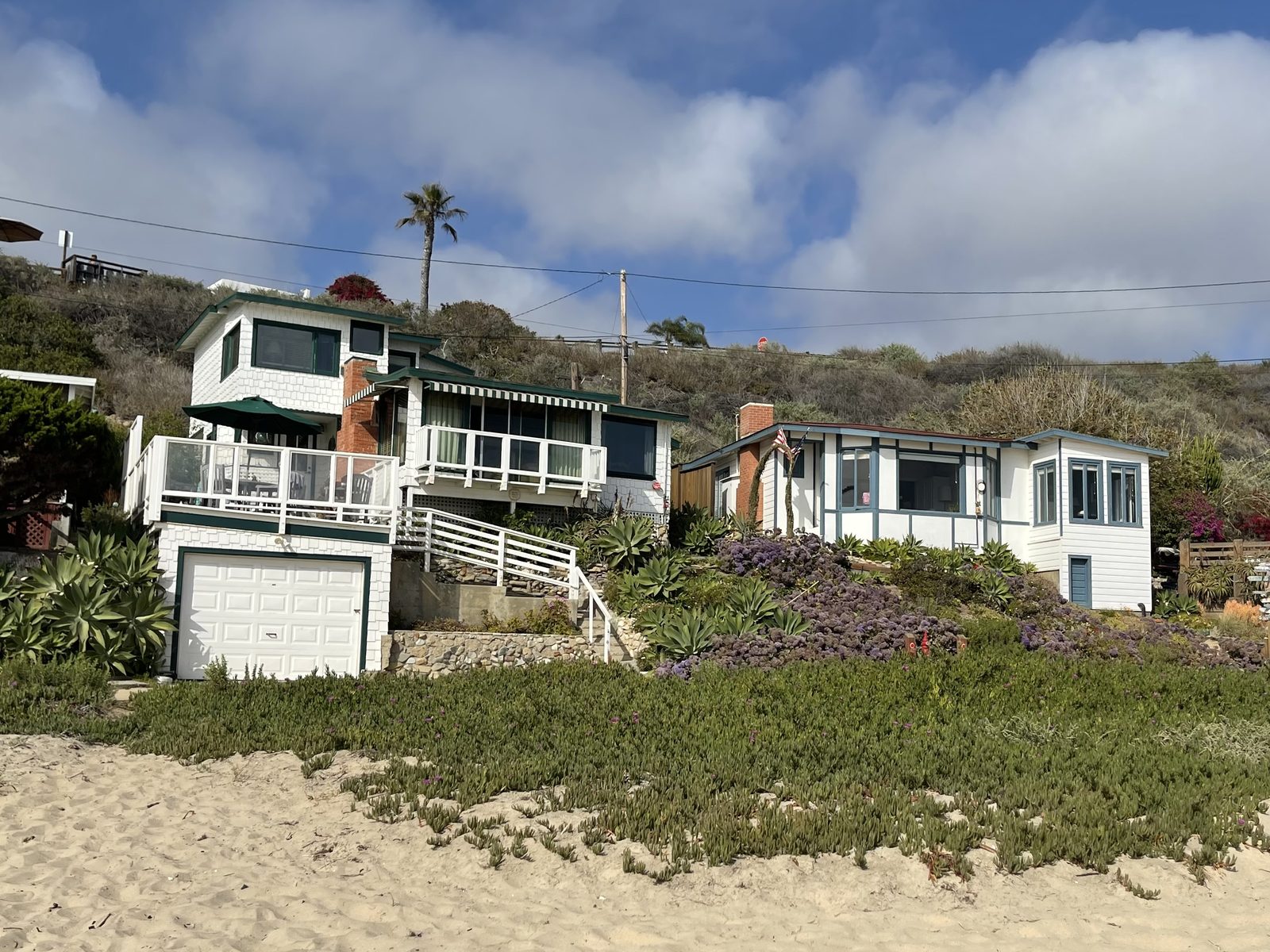 Historic beach cottages line the sand at Crystal Cove State Park. Reservations for the affected cottages were canceled through at least Tuesday while crews inspect the damage.