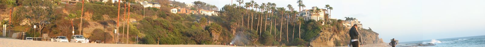 Blufftop homes above the sand in Laguna Beach, where coastal rules govern every alteration near the edge.