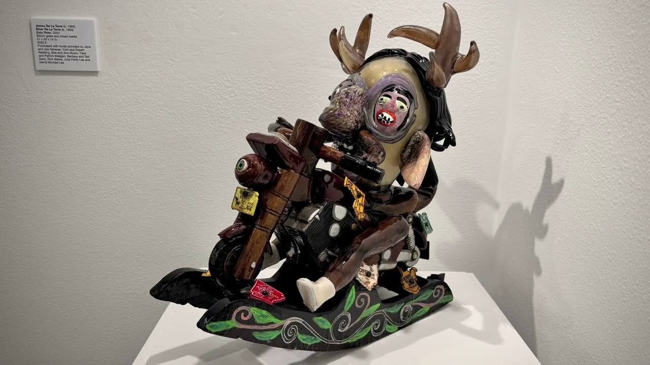 Easy Rider, a 2024 blown glass and mixed media sculpture by Einar and Jamex de la Torre, on view at Laguna Art Museum.
