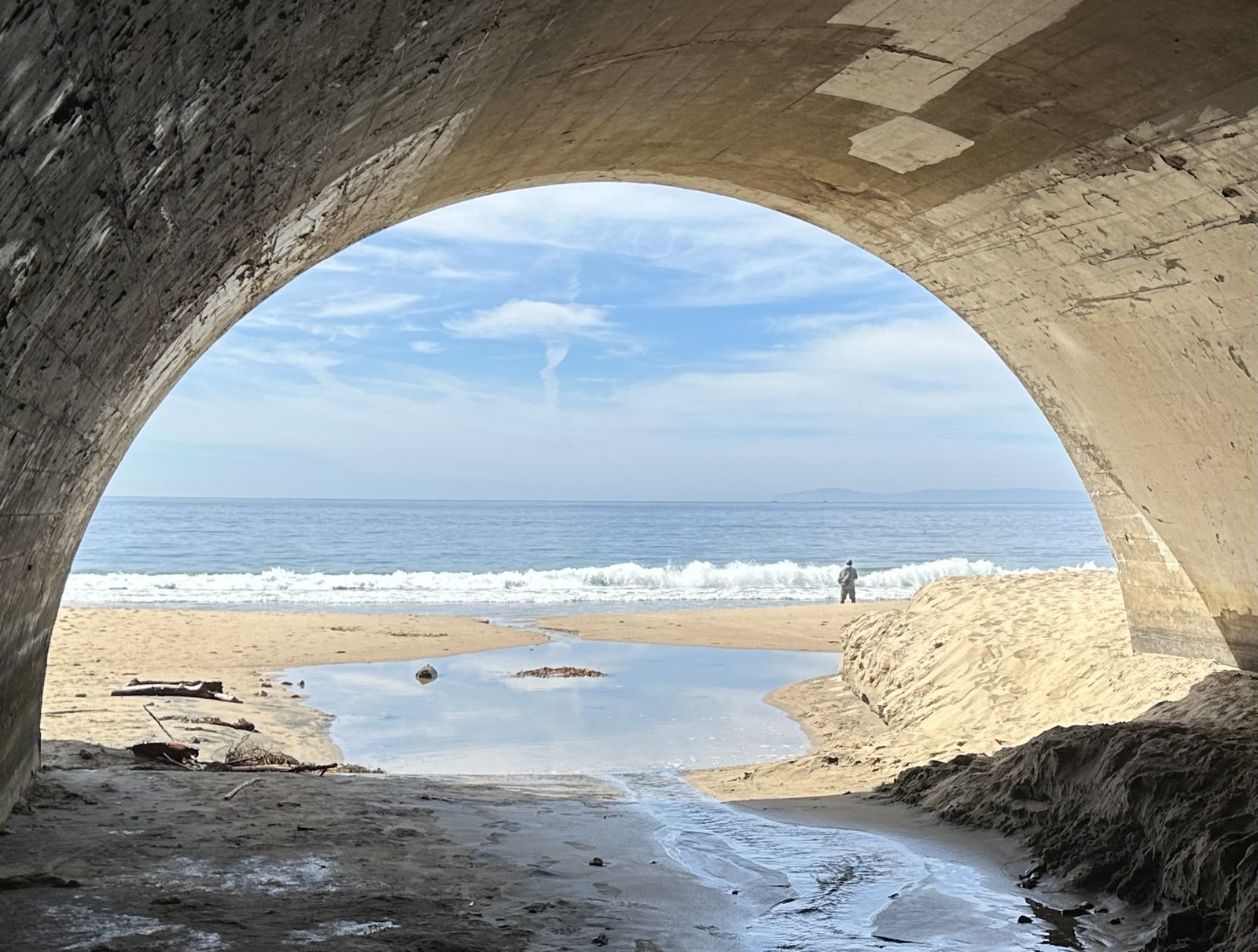 Moro Canyon Creek passes under Pacific Coast Highway at Crystal Cove State Park and reaches the Pacific at Moro Beach, in the El Morro area where a crack opened in the bluff below the road.