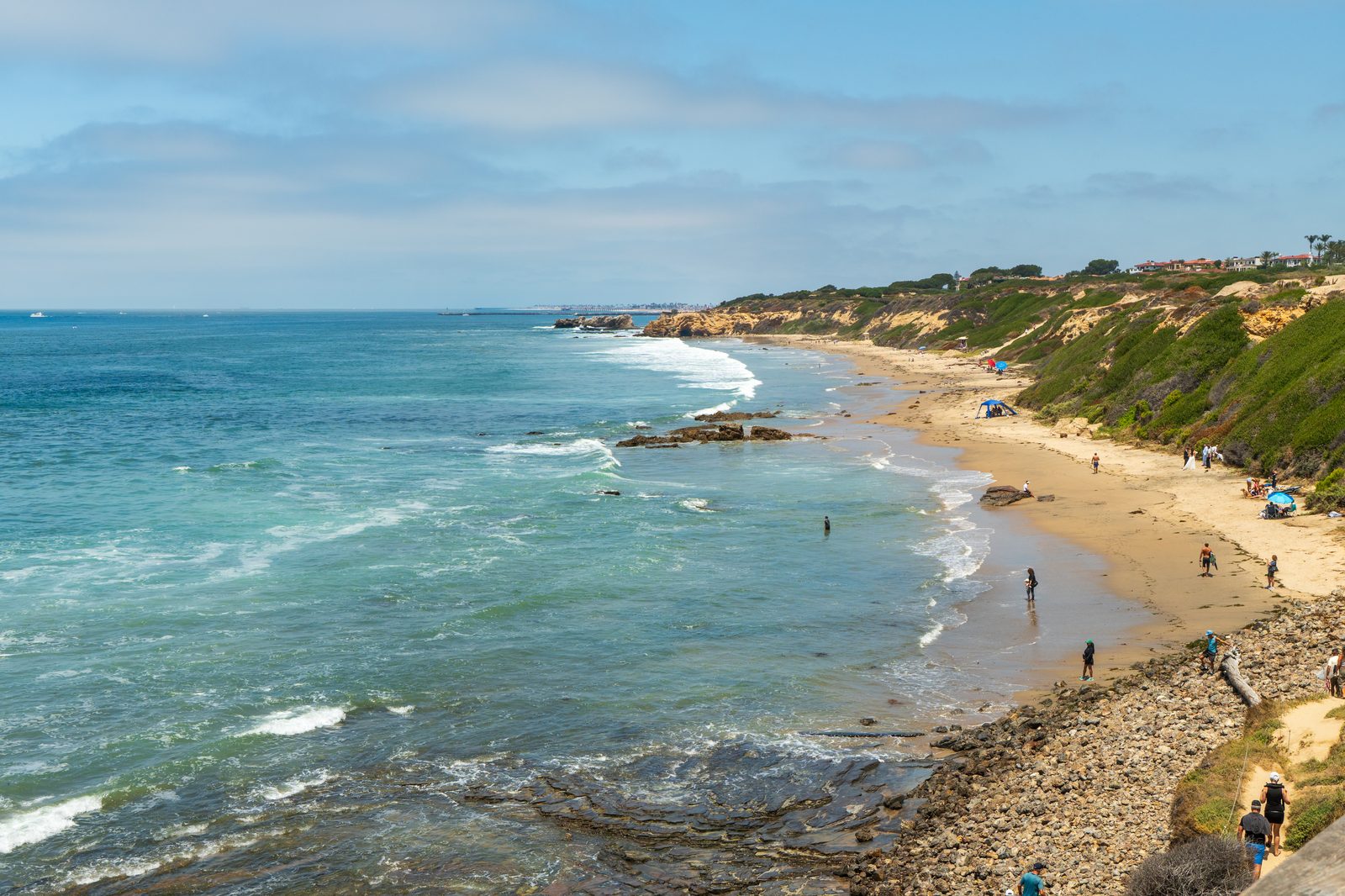 The layered rocks at Pelican Point in Crystal Cove State Park, along the coast below Pacific Coast Highway at El Morro. Caltrans has secured $4 million in emergency funding to repair the cracked slope below the highway.