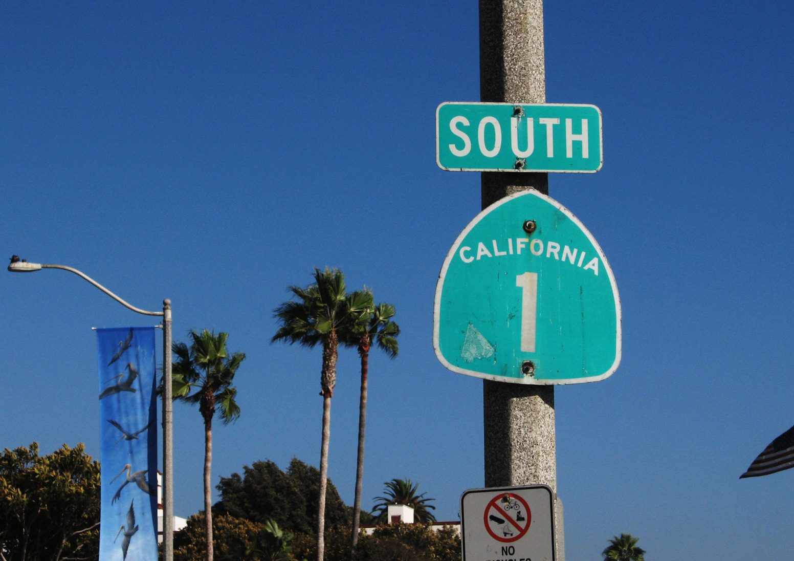 A Highway 1 marker on Coast Highway in Laguna Beach, where e-bike and speeding enforcement remains a police priority.