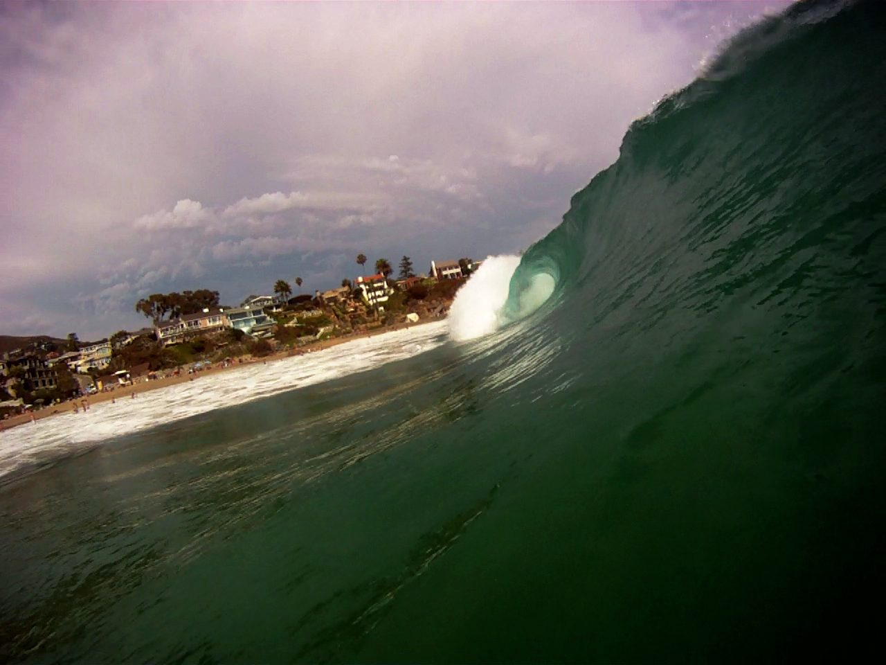 A large wave breaks at Crescent Bay in Laguna Beach. The Weather Service expects high surf of 5 to 8 feet Sunday with locally higher sets as Rachel's energy combines with other swells.