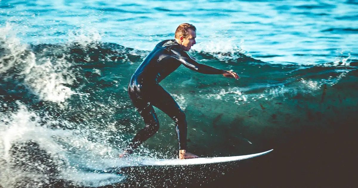 A surfer rides a wave in Laguna Beach. Viszolay made his name at the town's Brooks Street break.