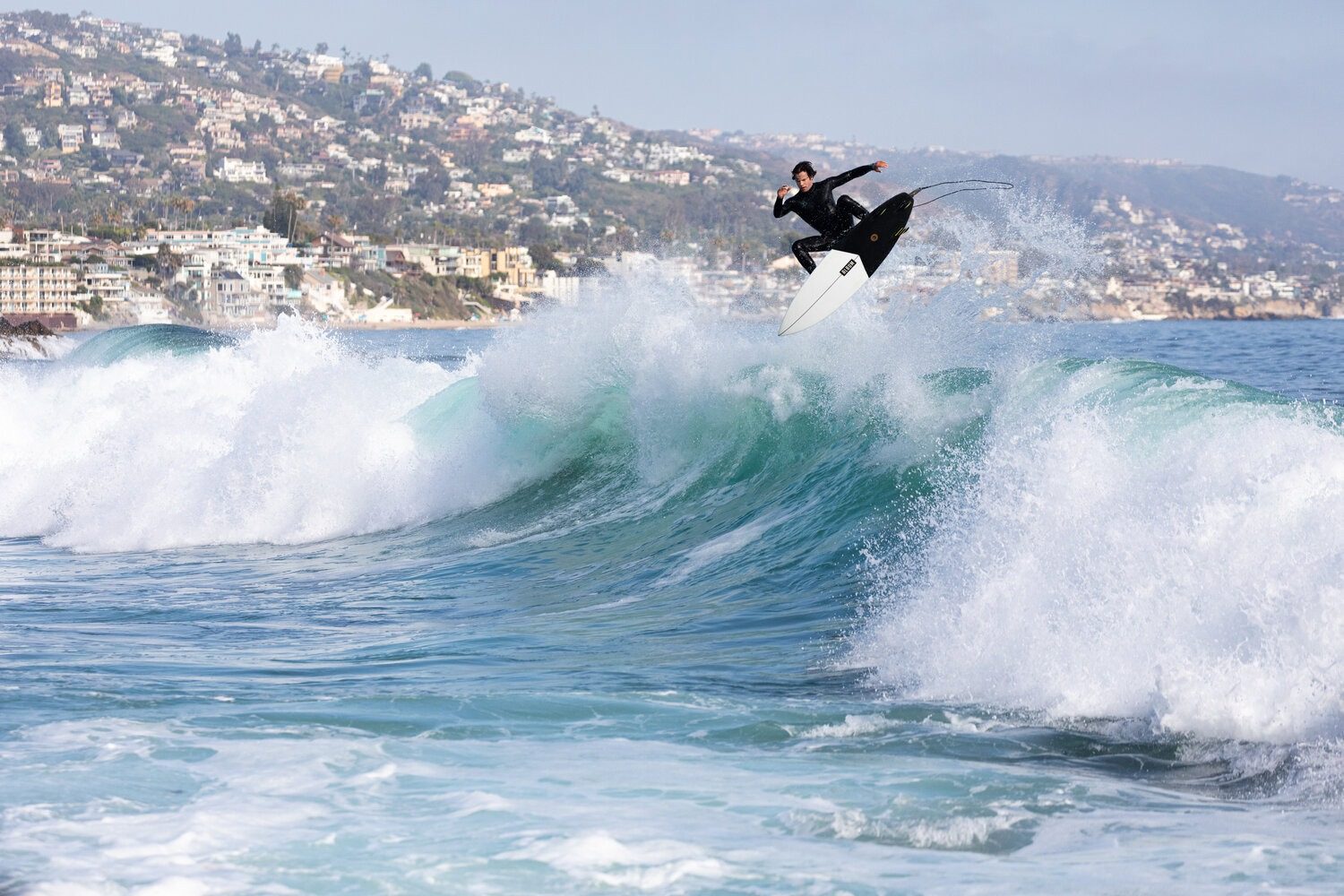 A surfer launches off a Laguna Beach wave. The town's surf community packed the fundraiser at the Surfing Heritage and Culture Center on Saturday night.